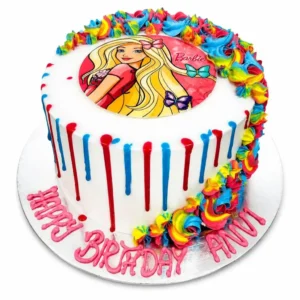 Barbie-themed birthday cake with rainbow details